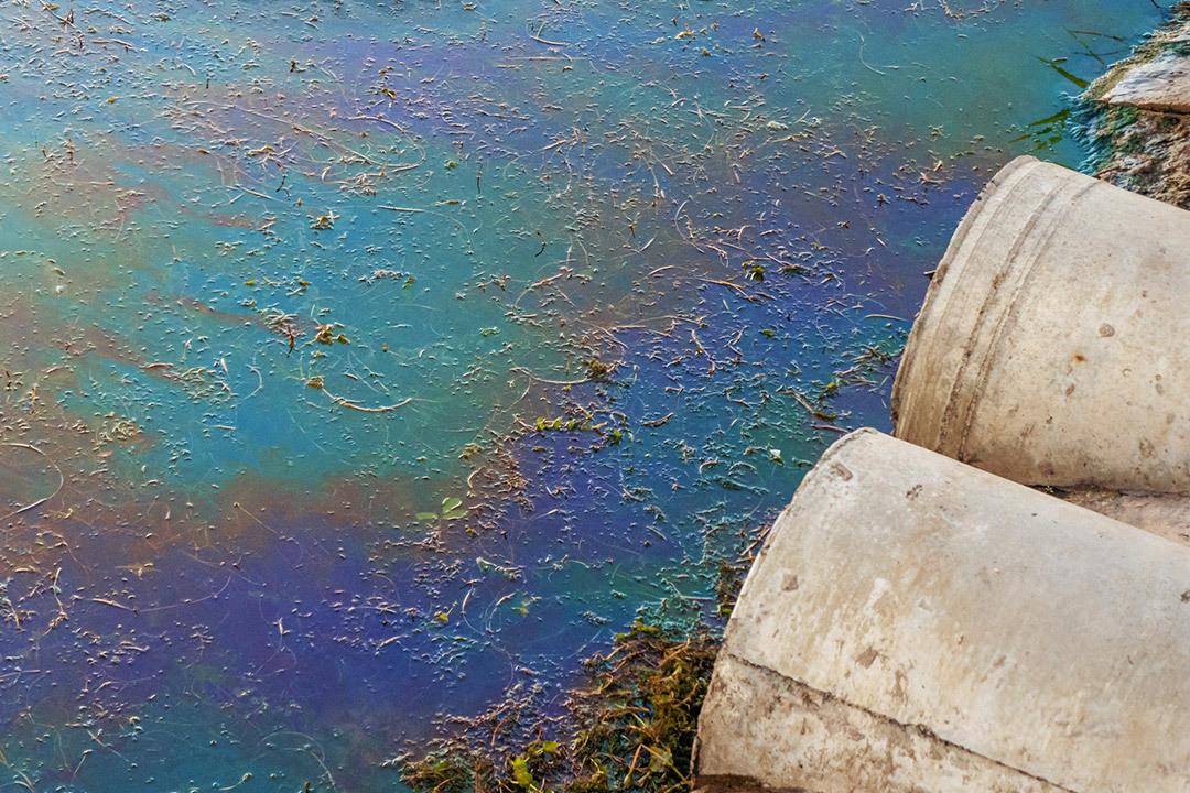 Oil spill on water.